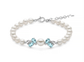 Bracciale di perle Oriente Celestia con Gemma del Cielo centrale in argento.