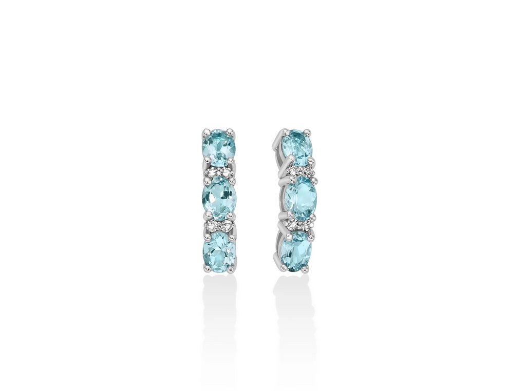 Orecchini trilogy con acquemarine ovali e diamanti in oro bianco