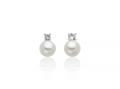 Orecchini Eva in argento con perla Oriente 6,5-7 mm illuminata da un topazio bianco.